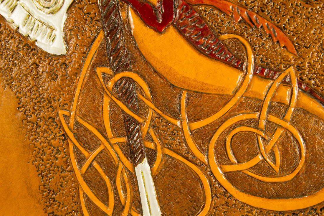 Close-Up of the modern Celtic knot that is the dragon's tail.