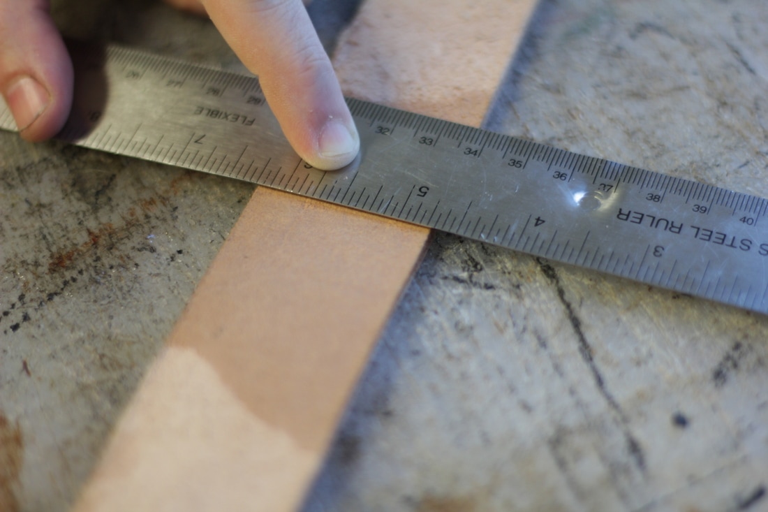 Line ruler up on line in leather