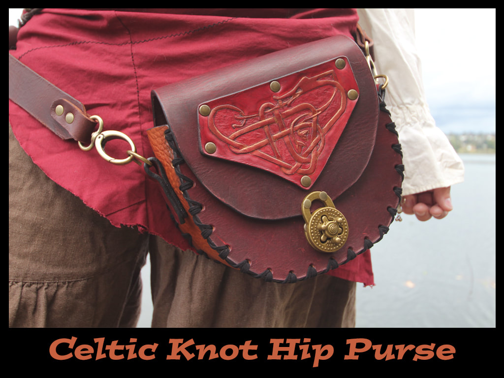 Red and tan dragon Celtic knot hip purse with twist lock.